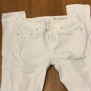 White ripped stretch jeans